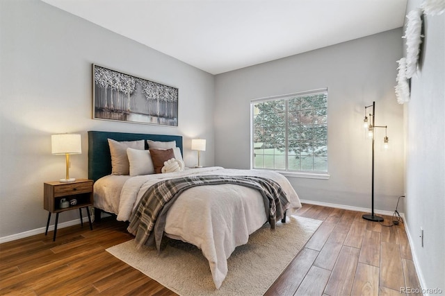 bedroom featuring dark wood-type flooring