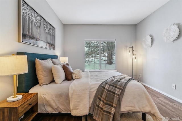 bedroom featuring wood-type flooring