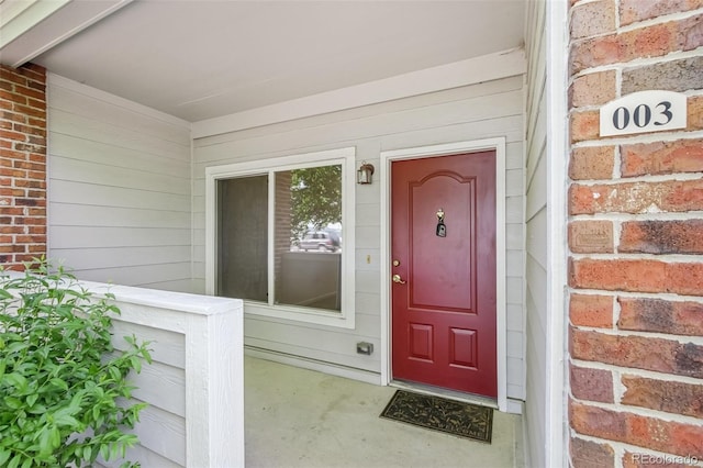 10129 W 55th Dr Unit 3, Arvada, CO 80002 - property entrance with brick siding