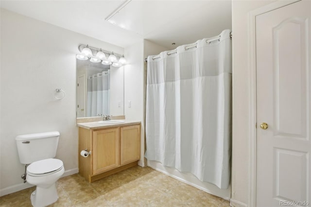 10129 W 55th Dr Unit 3, Arvada, CO 80002 - bathroom with vanity, toilet, and a shower with curtain