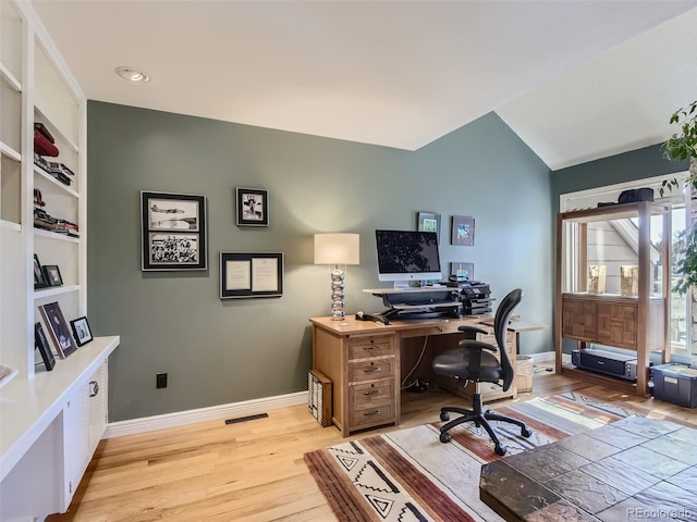 1540 W Briarwood Ave, Littleton, CO 80120 - office featuring light wood finished floors, baseboards, and built in shelves
