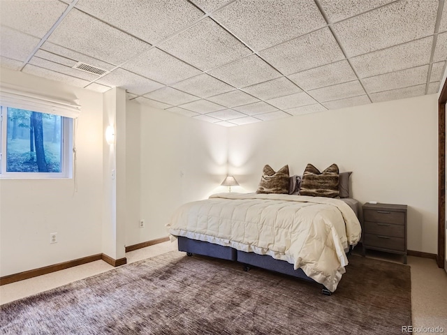 1540 W Briarwood Ave, Littleton, CO 80120 - carpeted bedroom featuring a paneled ceiling and baseboards