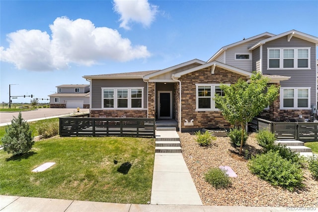 15501 E 112th Ave Unit 6F, Commerce City, CO 80022 - view of front of house with stone siding