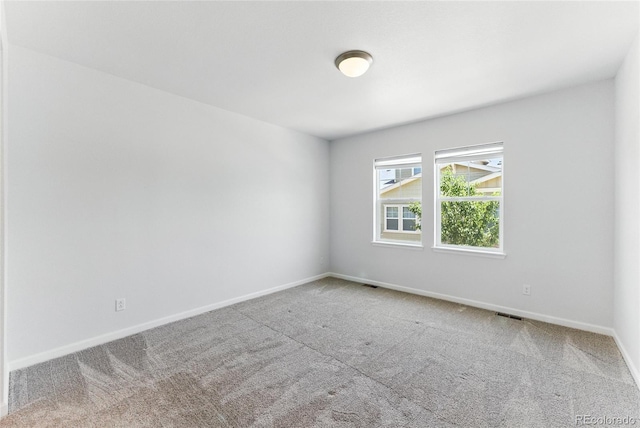 15501 E 112th Ave Unit 6F, Commerce City, CO 80022 - spare room with carpet floors