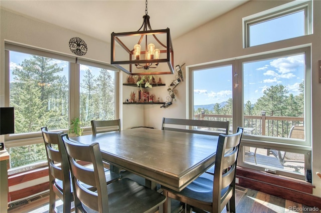 61 Country Sky Ln, Estes Park, CO 80517 - dining room with a chandelier and wood finished floors