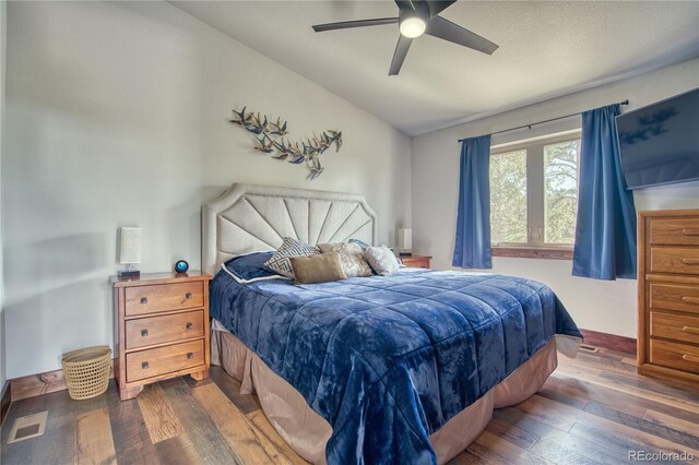 61 Country Sky Ln, Estes Park, CO 80517 - bedroom featuring hardwood / wood-style flooring, vaulted ceiling, and ceiling fan