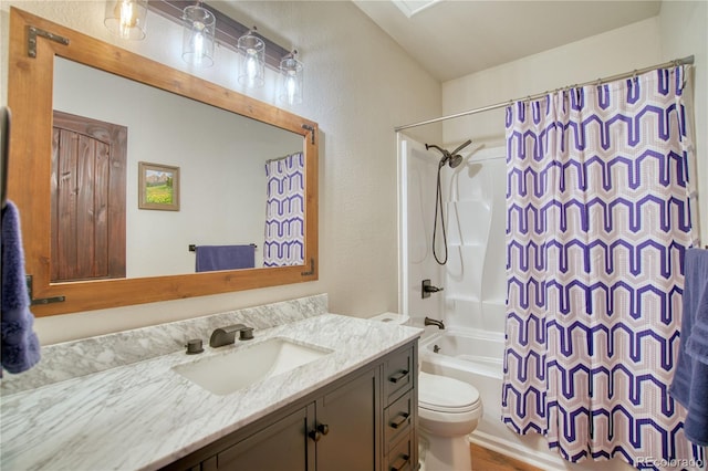 61 Country Sky Ln, Estes Park, CO 80517 - bathroom featuring vanity, shower / tub combo, a textured wall, and wood finished floors