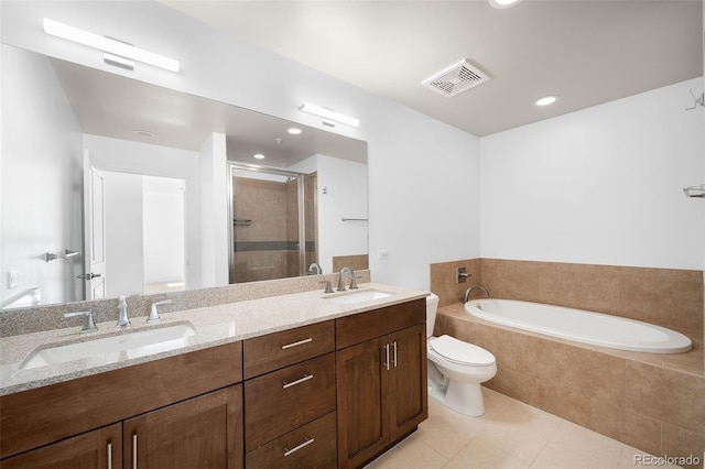 3301 Arapahoe Ave Unit 411, Boulder, CO 80303 - bathroom featuring tile patterned flooring, a shower stall, double vanity, a bath, and recessed lighting