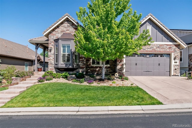 view of front facade featuring a front yard and a garage