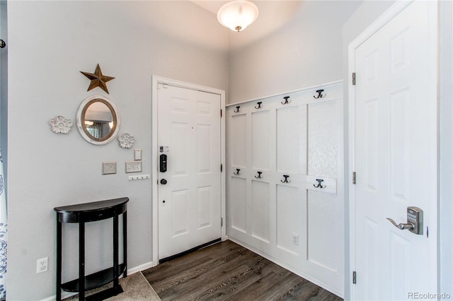 4483 S Fundy St, Centennial, CO 80015 - foyer entrance featuring dark wood finished floors and baseboards