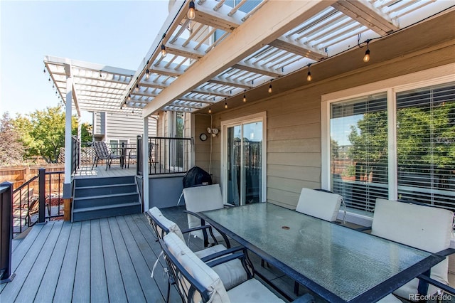 4483 S Fundy St, Centennial, CO 80015 - wooden terrace with outdoor dining space and a pergola