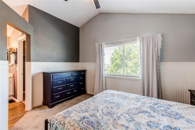 4483 S Fundy St, Centennial, CO 80015 - bedroom with wainscoting, lofted ceiling, ceiling fan, and wood finished floors