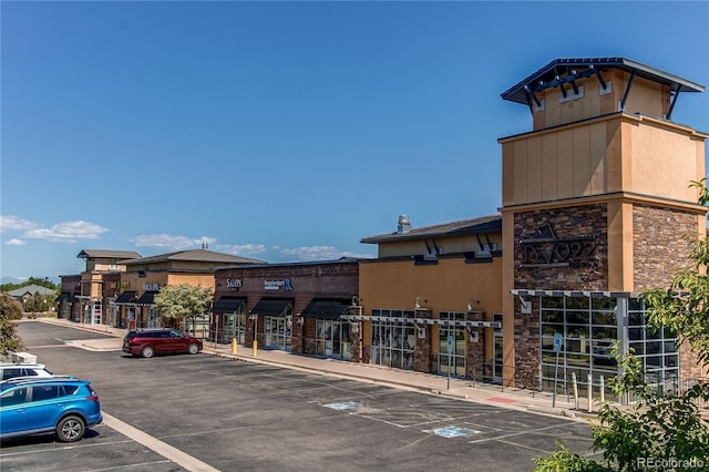 4483 S Fundy St, Centennial, CO 80015 - view of commercial property featuring uncovered parking
