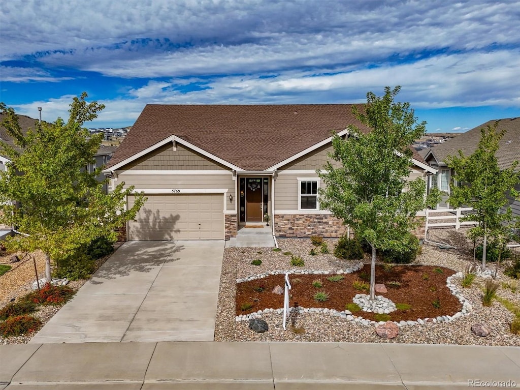 craftsman-style home with a garage