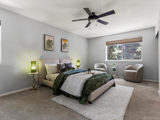 9696 E Kansas Cir Unit 2, Denver, CO 80247 - bedroom featuring carpet and a ceiling fan