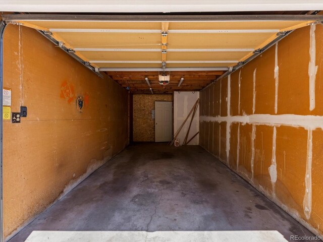 9696 E Kansas Cir Unit 2, Denver, CO 80247 - garage with a garage door opener