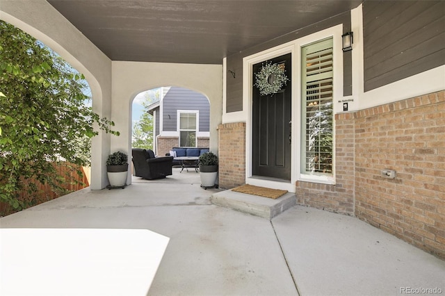 25548 E Fair Dr, Aurora, CO 80016 - doorway to property with brick siding and outdoor lounge area