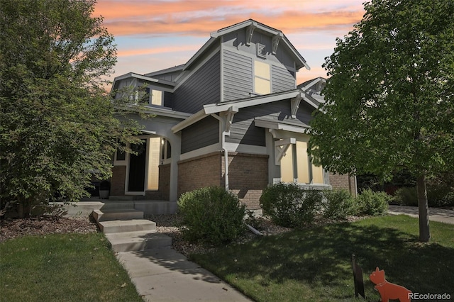 25548 E Fair Dr, Aurora, CO 80016 - view of front facade featuring brick siding and a front yard