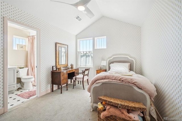1455 Flowers Ct, Erie, CO 80516 - bedroom featuring lofted ceiling, wallpapered walls, light colored carpet, and visible vents
