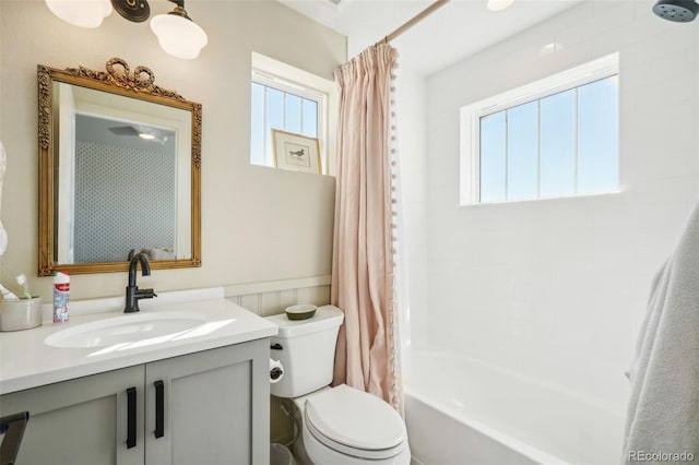 1455 Flowers Ct, Erie, CO 80516 - full bathroom featuring vanity, a wainscoted wall, shower / bath combination with curtain, and toilet