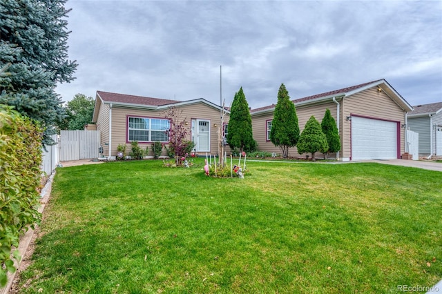 ranch-style home with a front yard and a garage