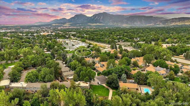 aerial view at dusk with a mountain view