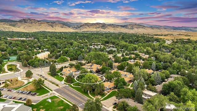 aerial view at dusk with a mountain view