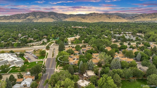 aerial view at dusk with a mountain view