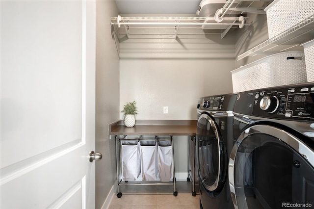 23421 E Rockinghorse Pkwy, Aurora, CO 80016 - laundry area with independent washer and dryer and tile patterned floors