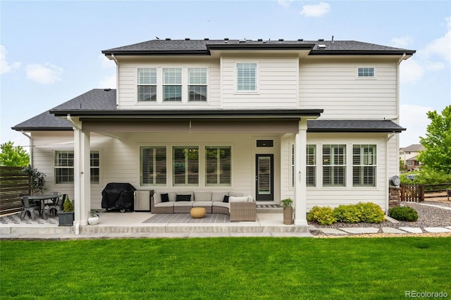 23421 E Rockinghorse Pkwy, Aurora, CO 80016 - rear view of house with an outdoor hangout area and a patio area