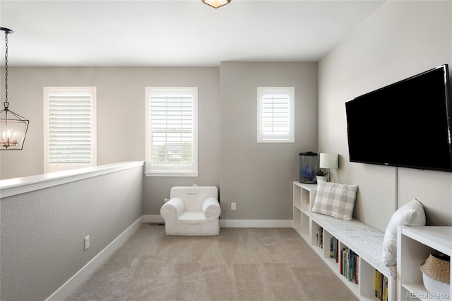 23421 E Rockinghorse Pkwy, Aurora, CO 80016 - living area featuring a chandelier and carpet floors