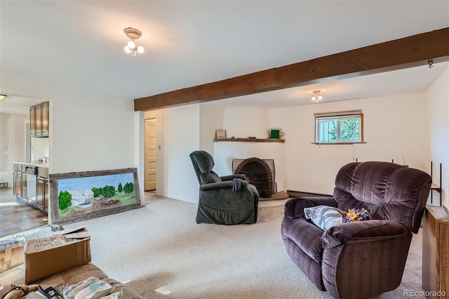 living room with beamed ceiling and light carpet