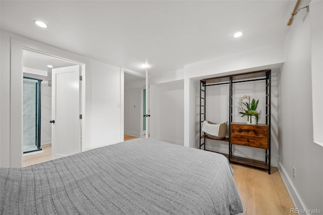 bedroom featuring light wood-type flooring