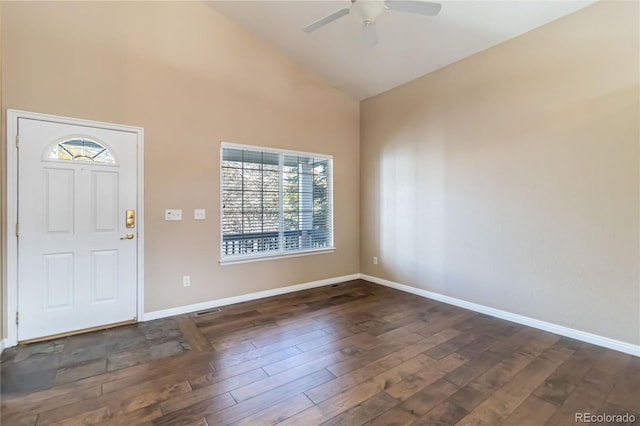 foyer featuring high vaulted ceiling, ceiling fan, and dark wood-type flooring