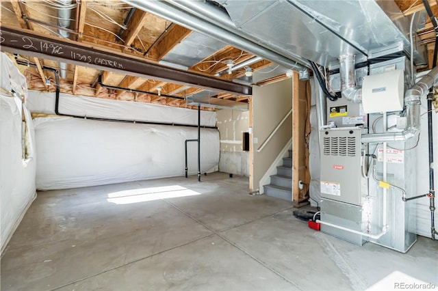 basement featuring heating unit