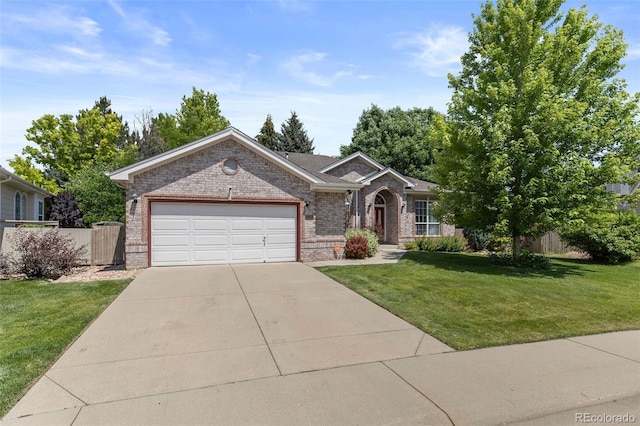 329 Bobcat Pt, Lafayette, CO 80026 - single story home featuring brick siding, an attached garage, and driveway