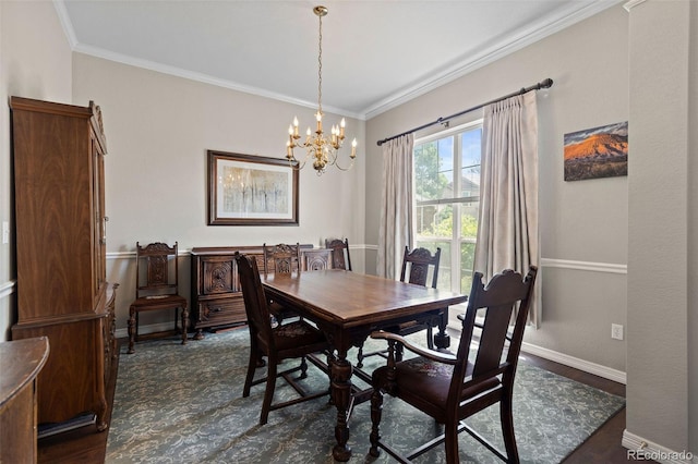 329 Bobcat Pt, Lafayette, CO 80026 - dining room featuring a chandelier, ornamental molding, and dark wood-style floors