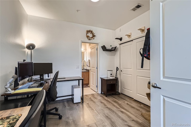 office space featuring light hardwood / wood-style floors