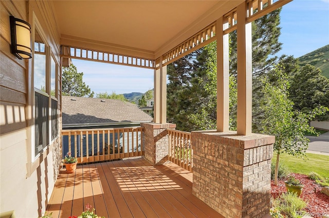 165 Washington St, Golden, CO 80403 - wooden terrace featuring a mountain view