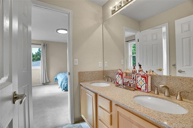 165 Washington St, Golden, CO 80403 - full bathroom featuring double vanity and baseboards