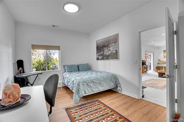 165 Washington St, Golden, CO 80403 - bedroom featuring wood finished floors, an office area, baseboards, and recessed lighting