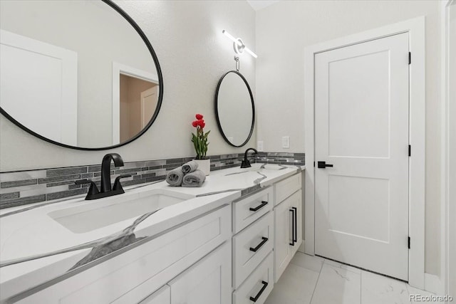 27250 E Nova Cir, Aurora, CO 80016 - bathroom with marble finish flooring, double vanity, and tasteful backsplash