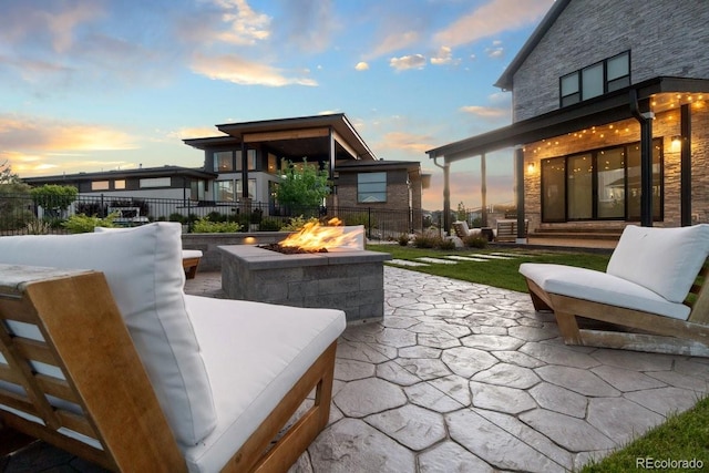 27250 E Nova Cir, Aurora, CO 80016 - view of patio / terrace featuring an outdoor fire pit and fence