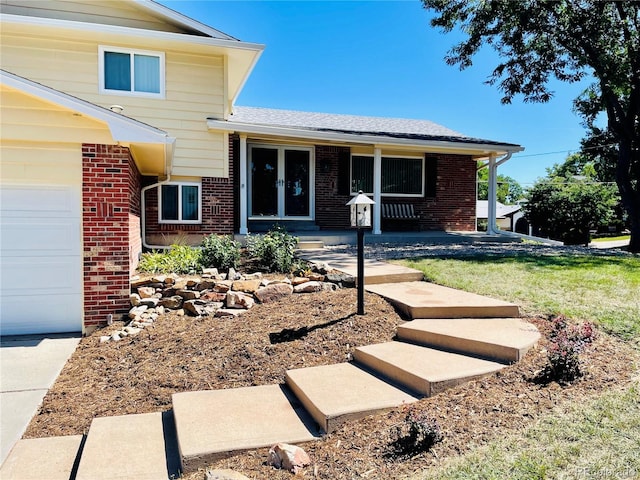 view of front of home with a garage