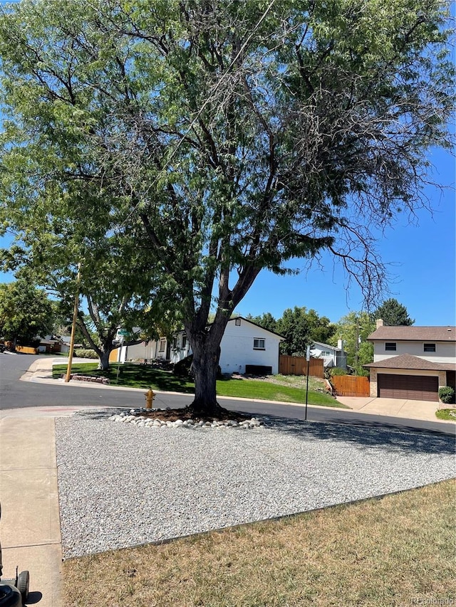 view of yard featuring a garage