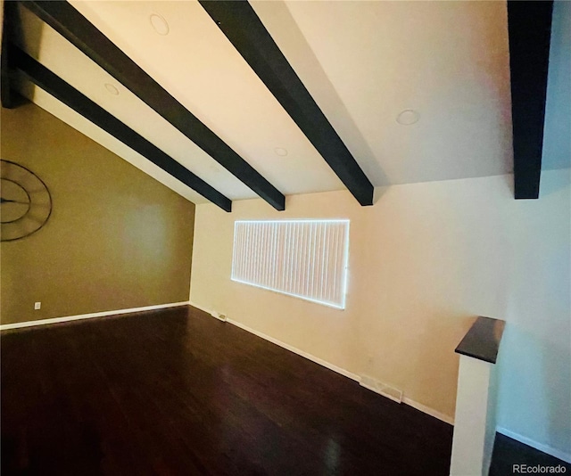 bonus room with lofted ceiling with beams and dark hardwood / wood-style flooring