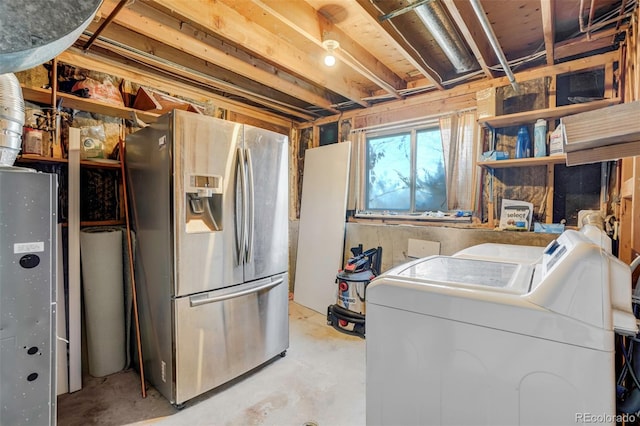 washroom featuring washing machine and dryer