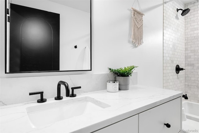 659 Albion St, Denver, CO 80220 - full bathroom with double vanity and bathing tub / shower combination