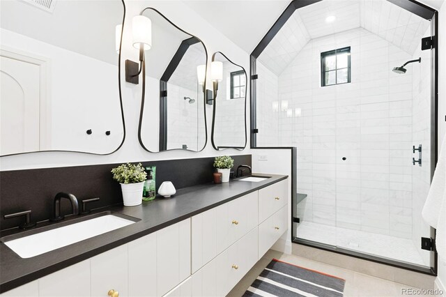 659 Albion St, Denver, CO 80220 - bathroom featuring a shower stall and double vanity