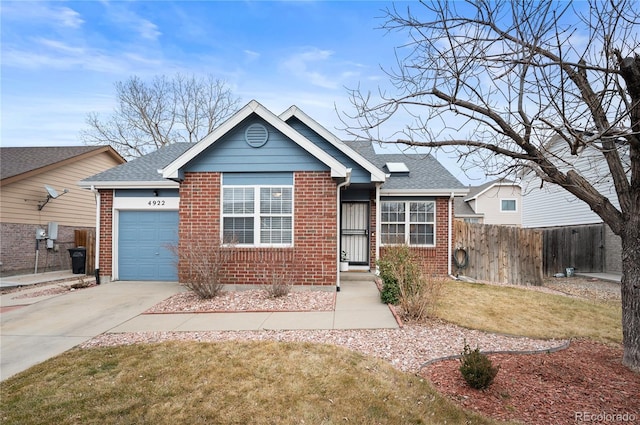 ranch-style house with an attached garage, fence, concrete driveway, and brick siding